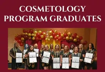 Group of cosmetology students posing on stage with certificates and balloons