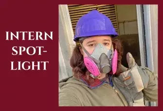 SVCC Student May Levonian in a purple hardhat and mask giving a thumbs up 