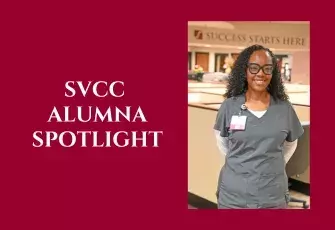 SVCC  Alumna Spotlight Ashley Greene wearing nursing scrubs in front of SVCC sign