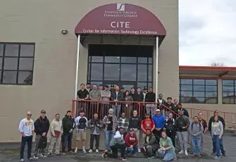 Group of military students posed in front of the SVCC CITE Workforce building