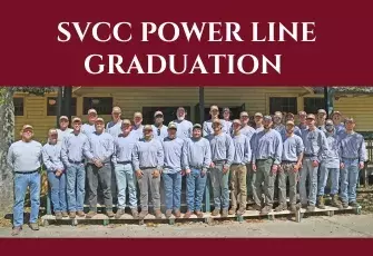 Picture of large group of Power Line graduates standing on the porch of a building