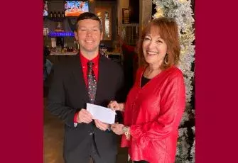 Jamie Jones, Executive Director of the SVCC Foundation receives a donation from Joy Stump, Community Relations Coordinator at Southside Electric Cooperative to support SVCC's Career Coach Program